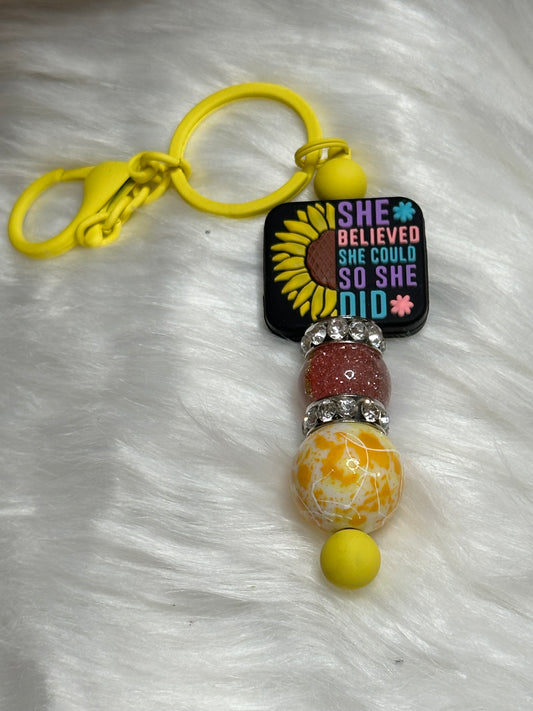 #7 she believed she could keychain bar