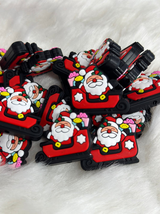 #162 Santa on sled silicone focal beads